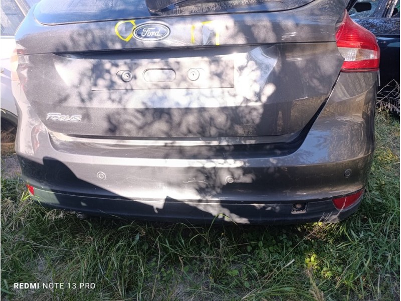 Recambio de paragolpes trasero para ford focus lim. sport referencia OEM IAM 1877243  