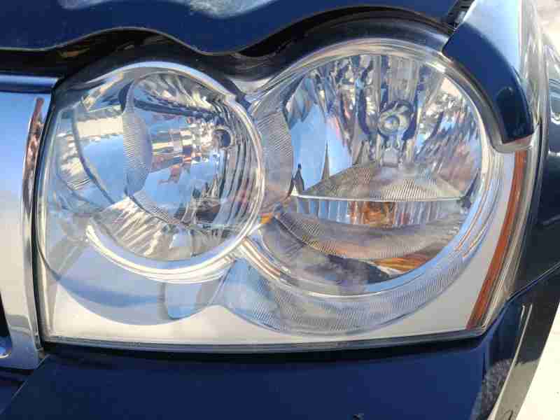 Recambio de faro izquierdo para jeep grand cherokee iii (wh, wk) 3.0 crd 4x4 referencia OEM IAM 55156671AK  